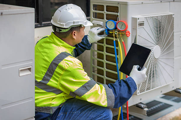 Professional Hvac technician working in Hackett, AR